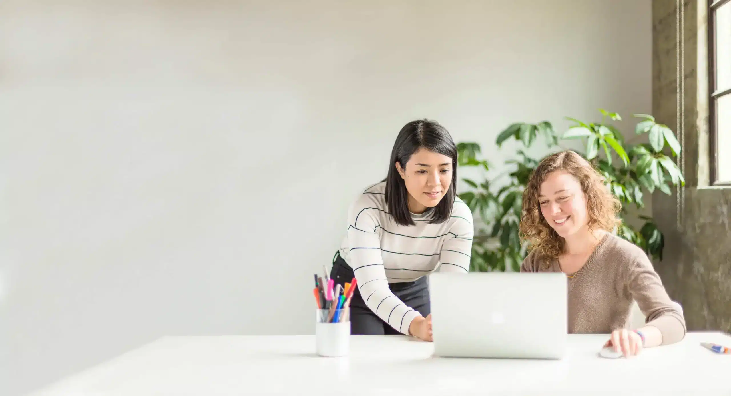 Two Women with a Laptop