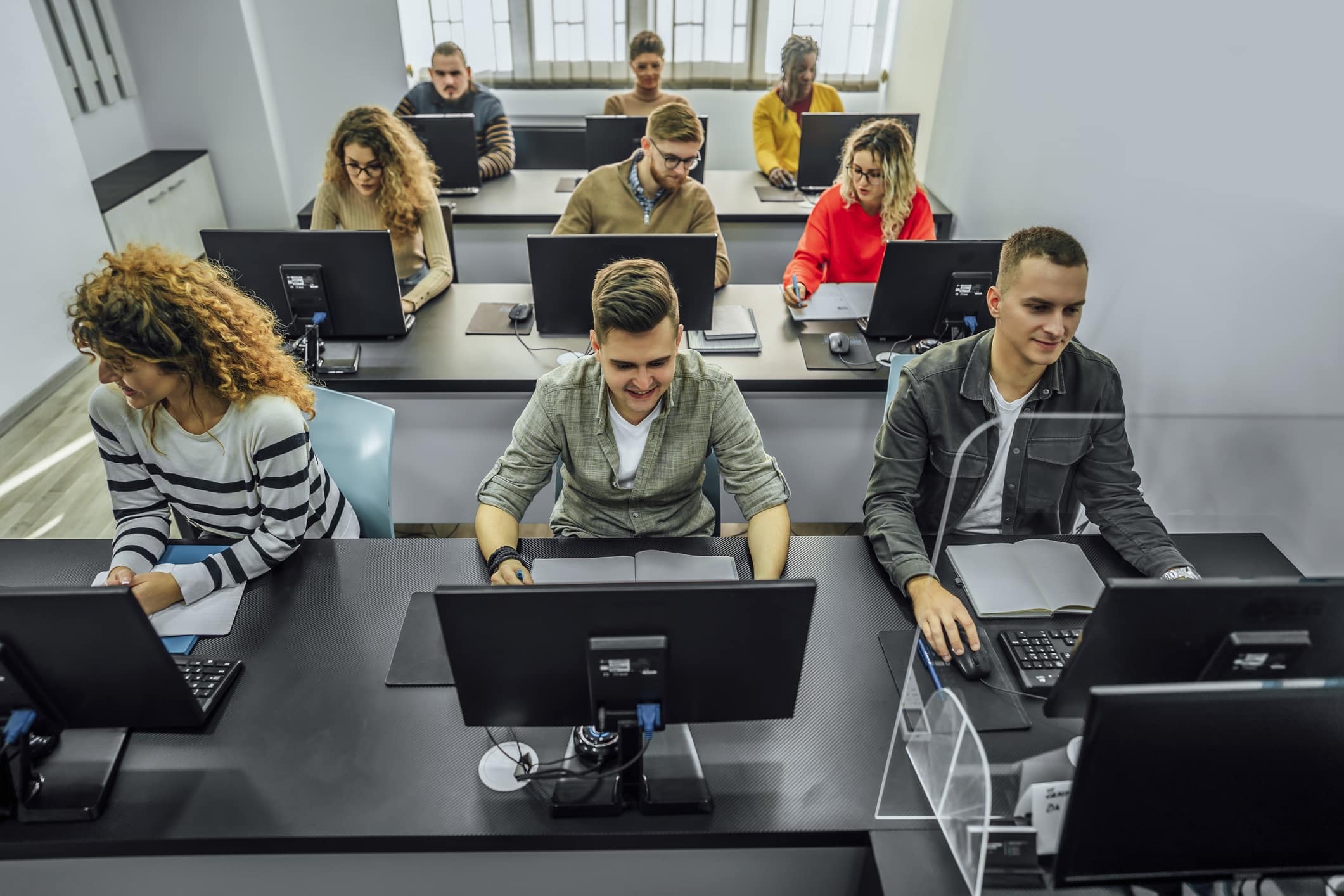 Students working together in the computer lab