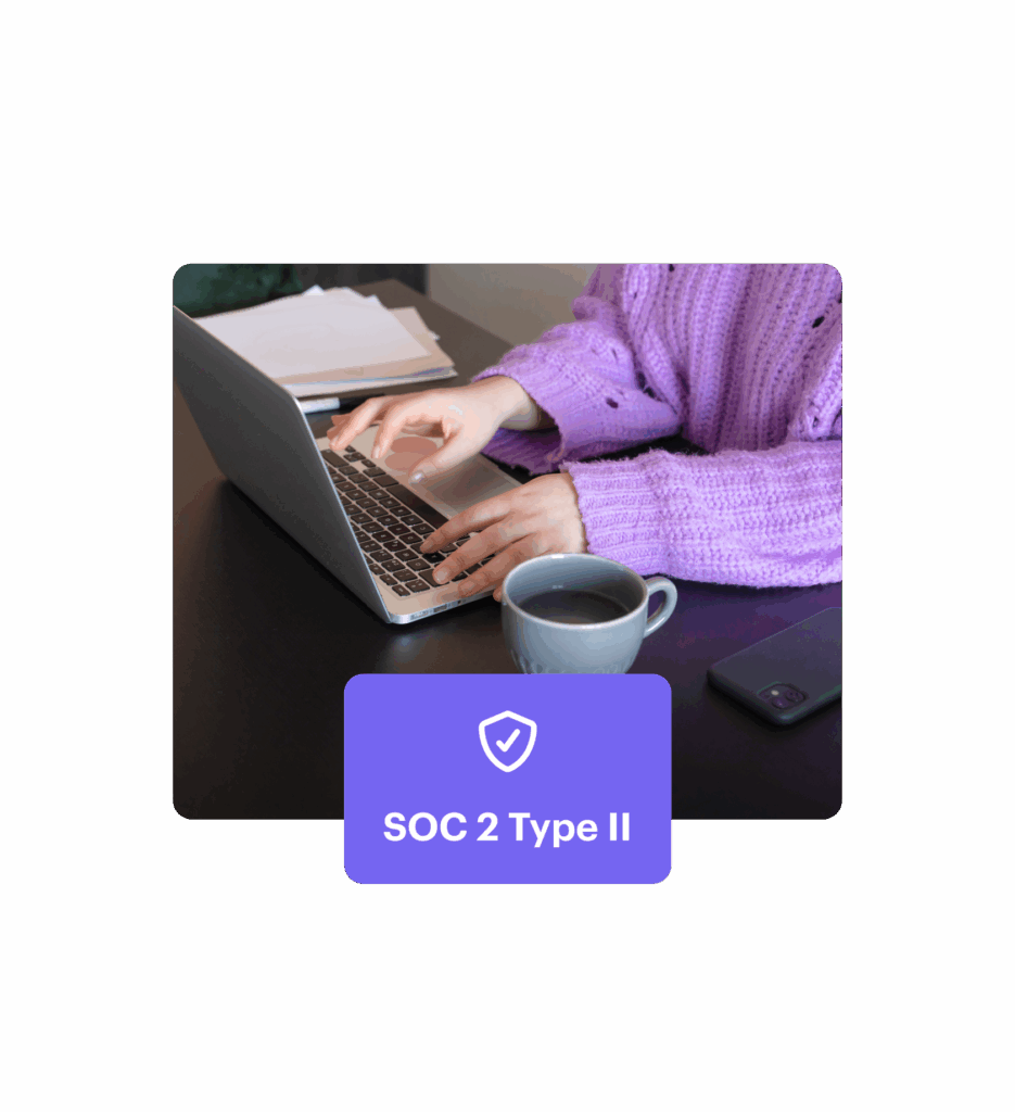 Laptop on desk with a box overlayed. In the box, a shield with a check mark and text showcase the product’s SOC2 Type II security compliance rating.